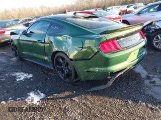 2022 Ford Mustang GT with VIN 1FA6P8CFXN5113099, listed as a IAAI auction lot 41243998 with 9,475 mi miles and . Bid and sale history available at DreamBid. Image 3.