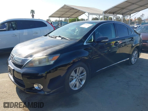 2010 Lexus HS 250h with VIN JTHBB1BA0A2016668, listed as a IAAI auction lot 42141367 with 120,823 mi miles. Bid and sale history available at carsss.com. Image 2.