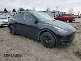 2023 Tesla Model Y Long Range with VIN 7SAYGDEE1PA150771, listed as a Copart auction lot 81805194 with 23,718 mi miles and Salvage Title. Bid and sale history available at DreamBid. Image 4.