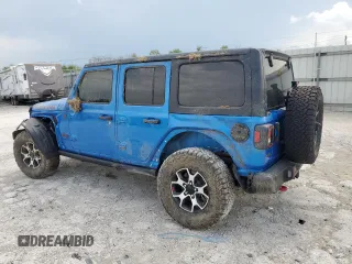 2021 Jeep Wrangler Unlimited Rubicon with VIN 1C4JJXFM7MW794325, listed as a Copart auction lot 54525315 with 43,826 mi miles and Salvage title. Bid and sale history available at DreamBid. Image 2.