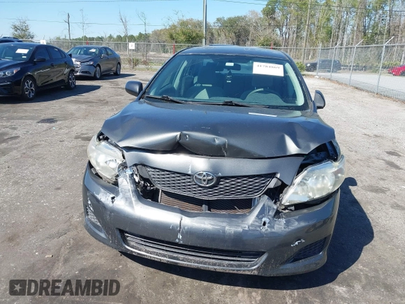 2010 Toyota Corolla with VIN 2T1BU4EE0AC371711, listed as a IAAI auction lot 41784869 with 82,999 mi miles. Bid and sale history available at carsss.com. Image 12.