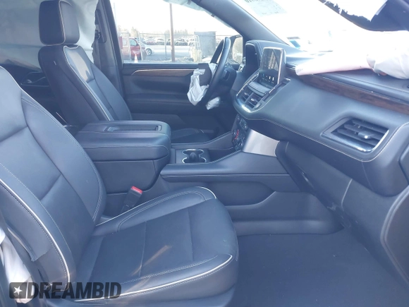 2023 Chevrolet Suburban Premier with VIN 1GNSKFKD3PR263697, listed as a IAAI auction lot 41903910 with 31,574 mi miles and . Bid and sale history available at DreamBid. Image 5.