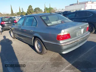 2001 BMW 7 Series 740iL with VIN WBAGH83491DP25818, listed as a IAAI auction lot 41827907 with 125,670 mi miles. Bid and sale history available at carsss.com. Image 3.