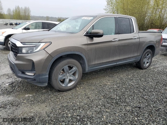 2021 Honda Ridgeline RTL-E with VIN 5FPYK3F78MB016027, listed as a Copart auction lot 52218845 with 67,428 mi miles and Salvage Title. Bid and sale history available at carsss.com. Image 1.