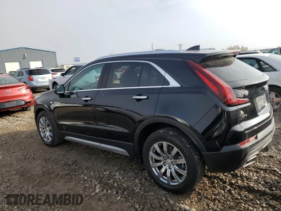 2021 Cadillac XT4 AWD Premium Luxury with VIN 1GYFZDR40MF080166, listed as a Copart auction lot 82883764 with 27,793 mi miles and Salvage Title. Bid and sale history available at carsss.com. Image 2.