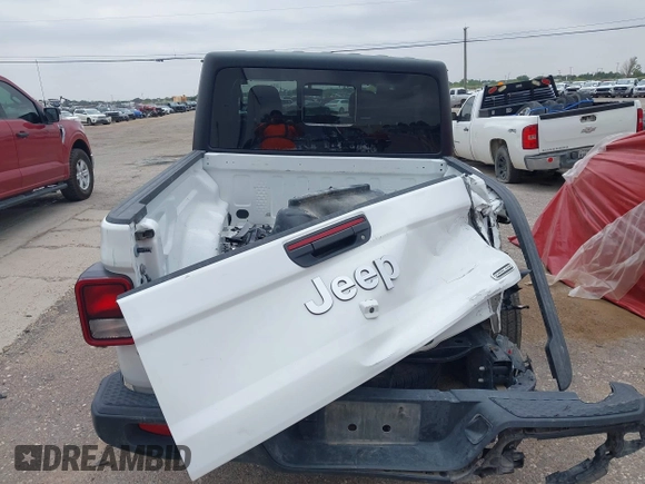 2023 Jeep Gladiator Overland z VIN 1C6HJTFG7PL566484, wystawiony jako IAAI lot #42424428 z przebiegiem 52 057 mil mil oraz . Historia ofert i sprzedaży dostępna na DreamBid. Obrazek 16.