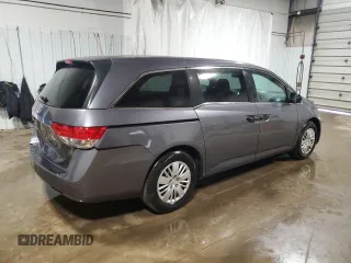 2015 Honda Odyssey LX with VIN 5FNRL5H25FB031580, listed as a Copart auction lot 48119255 with 143,552 mi miles and Salvage Title. Bid and sale history available at DreamBid. Image 3.