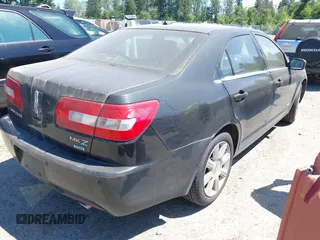 2009 Lincoln MKZ with VIN 3LNHM28T39R613353, listed as a IAAI auction lot 42644600 with 243,902 mi miles and . Bid and sale history available at DreamBid. Image 4.
