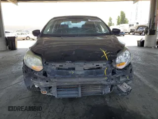 2012 Ford Focus SE with VIN 1FAHP3F25CL293041, listed as a Copart auction lot 58069955 with 127,129 mi miles and Salvage title. Bid and sale history available at DreamBid. Image 5.
