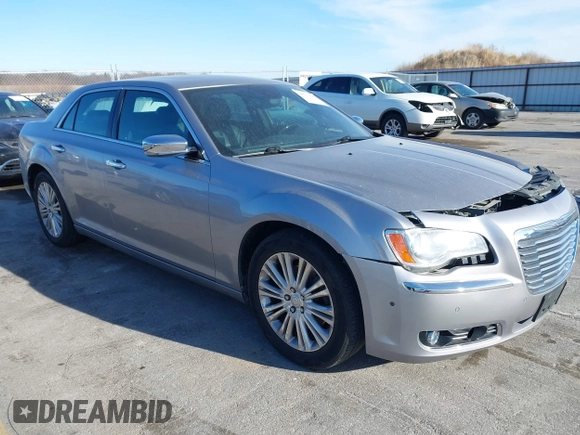 2014 Chrysler 300 C with VIN 2C3CCAKG3EH212936, listed as a IAAI auction lot 40921649 with 153,000 mi miles and . Bid and sale history available at carsss.com. Image 1.