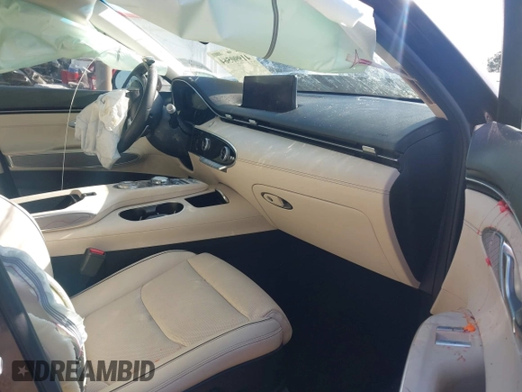 2022 Genesis GV70 2.5T with VIN KMUMADTB9NU050430, listed as a IAAI auction lot 41990564 with 36,308 mi miles and . Bid and sale history available at DreamBid. Image 5.