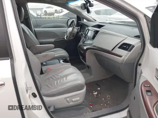 2011 Toyota Sienna XLE AAS with VIN 5TDYK3DC8BS003313, listed as a IAAI auction lot 41830631 with 214,514 mi miles and . Bid and sale history available at DreamBid. Image 5.