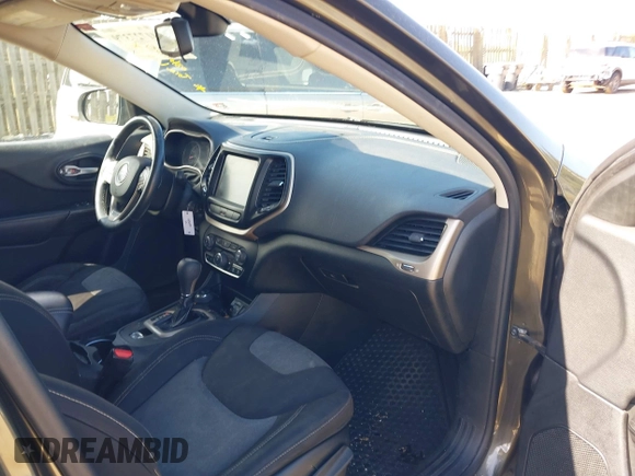 2014 Jeep Cherokee Latitude with VIN 1C4PJMCS5EW201462, listed as a IAAI auction lot 41727379 with 170,958 mi miles and . Bid and sale history available at DreamBid. Image 5.