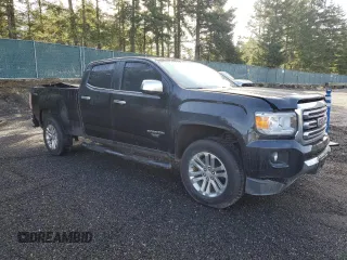 2015 GMC Canyon 4WD SLT with VIN 1GTG6CE37F1270301, listed as a Copart auction lot 47665365 with 135,300 mi miles and Salvage Title. Bid and sale history available at carsss.com. Image 4.