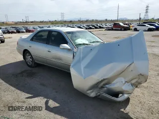 2000 Toyota Camry LE z VIN JT2BF28K0Y0261092, wystawiony jako Copart lot #58008665 z przebiegiem Nie podano mil oraz Szkoda całkowita • Salvage title. Historia ofert i sprzedaży dostępna na DreamBid. Obrazek 4.