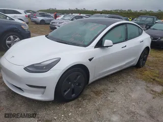 2022 Tesla Model 3 Long Range with VIN 5YJ3E1EBXNF267363, listed as a IAAI auction lot 40494604 with NaN miles. Bid and sale history available at carsss.com. Image 17.
