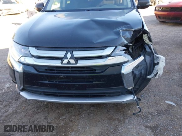 2018 Mitsubishi Outlander SE z VIN JA4AD3A32JJ003961, wystawiony jako IAAI lot #42297776 z przebiegiem 164 117 mil mil oraz . Historia ofert i sprzedaży dostępna na DreamBid. Obrazek 13.
