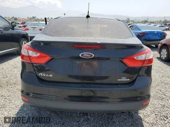 2012 Ford Focus SE with VIN 1FAHP3F22CL372232, listed as a Copart auction lot 59637645 with 134,337 mi miles and Salvage title. Bid and sale history available at DreamBid. Image 6.