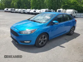 2016 Ford Focus SE with VIN 1FADP3FE2GL229229, listed as a Copart auction lot 57070435 with 114,535 mi miles and Salvage title. Bid and sale history available at DreamBid. Image 1.