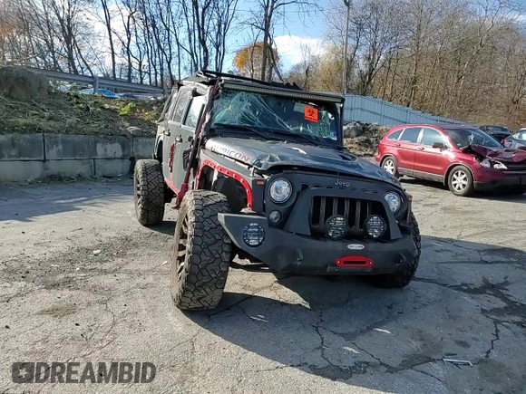2017 Jeep Wrangler Unlimited Rubicon Recon с VIN 1C4BJWFG8HL611160, выставлен на аукционе Copart как лот 45575665 с пробегом Не указан миль и На запчасти • Non repairable. История ставок и продаж доступна на DreamBid. Изображение 11.