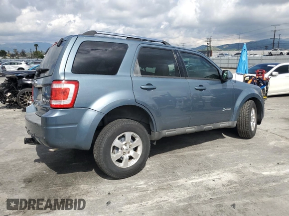 2010 Ford Escape Hybrid with VIN 1FMCU4K30AKC51022, listed as a Copart auction lot 51014615 with 128,275 mi miles and Salvage title. Bid and sale history available at DreamBid. Image 3.