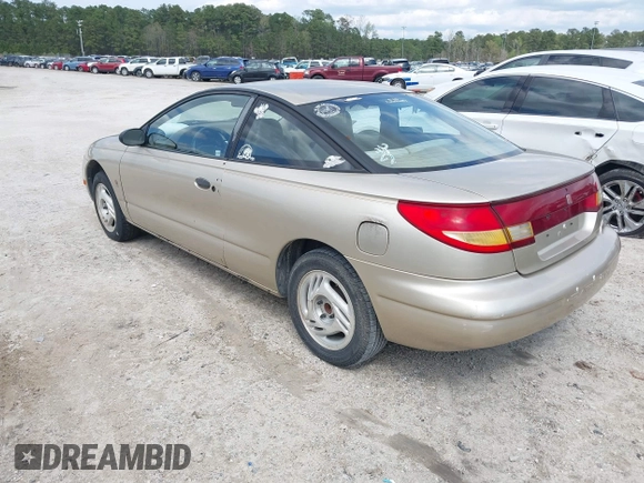 1997 Saturn SC z VIN 1G8ZE1285VZ125476, wystawiony jako IAAI lot #41832482 z przebiegiem 186 269 mil mil oraz . Historia ofert i sprzedaży dostępna na DreamBid. Obrazek 3.