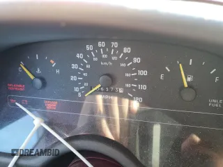 1991 Chevrolet Corsica z VIN 1G1LT53G3ME164497, wystawiony jako Copart lot #89163195 z przebiegiem 106 373 mil mil oraz Szkody całkowita. Historia ofert i sprzedaży dostępna na DreamBid. Obrazek 9.