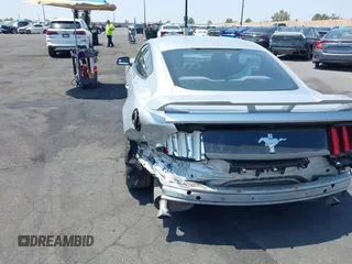 2015 Ford Mustang V6 with VIN 1FA6P8AM1F5342967, listed as a IAAI auction lot 42164817 with 106,700 mi miles and . Bid and sale history available at DreamBid. Image 3.