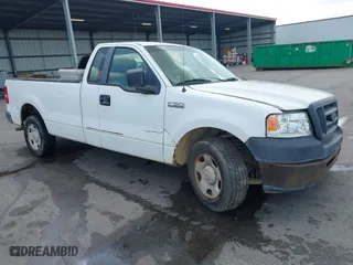 2007 Ford F-150 XL with VIN 1FTRF12W17NA26892, listed as a IAAI auction lot 41011688 with 158,088 mi miles. Bid and sale history available at carsss.com. Image 1.