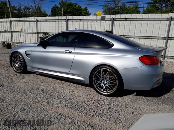 2015 BMW M4 with VIN WBS3R9C58FK334216, listed as a Copart auction lot 61497804 with 112,191 mi miles and Salvage Title. Bid and sale history available at carsss.com. Image 2.