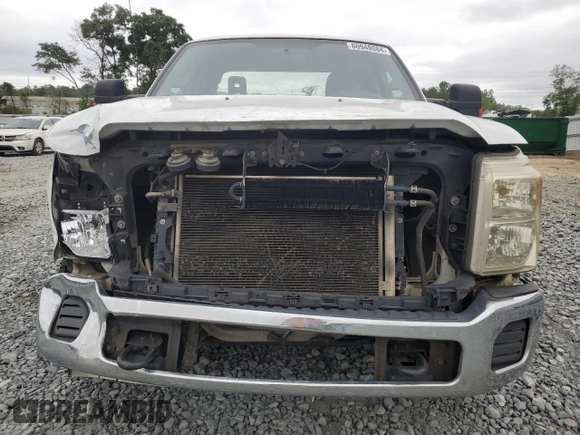 2014 Ford F-250 XLT with VIN 1FT7X2A65EEA98638, listed as a Copart auction lot 60948084 with 319,812 mi miles and Salvage title. Bid and sale history available at DreamBid. Image 5.