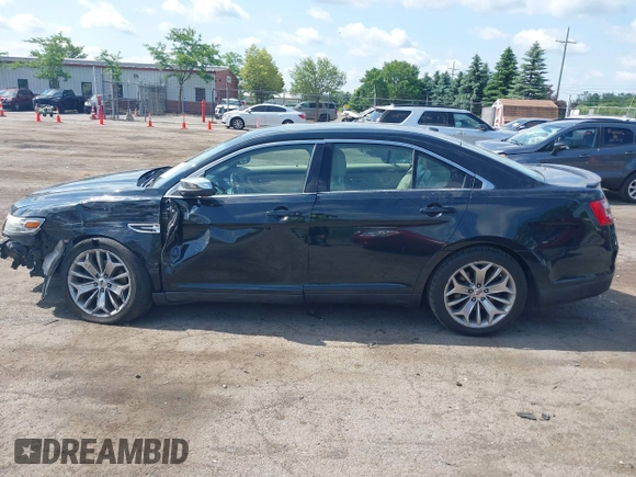 2014 Ford Taurus Limited z VIN 1FAHP2F85EG125118, wystawiony jako IAAI lot #42457437 z przebiegiem 129 406 mil mil oraz . Historia ofert i sprzedaży dostępna na DreamBid. Obrazek 14.
