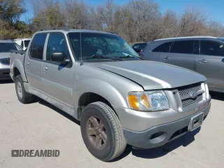 2005 Ford Explorer Sport Trac XLS z VIN 1FMZU67K75UA18027, wystawiony jako IAAI lot #41694106 z przebiegiem 144 900 mil mil oraz . Historia ofert i sprzedaży dostępna na DreamBid. Obrazek 1.