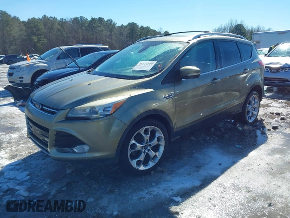 2013 Ford Escape Titanium with VIN 1FMCU9J99DUD46870, listed as a IAAI auction lot 41614409 with 141,739 mi miles and . Bid and sale history available at DreamBid. Image 2.