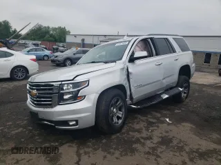 2015 Chevrolet Tahoe LT z VIN 1GNSKBKC8FR565663, wystawiony jako Copart lot #57071205 z przebiegiem Nie podano mil oraz Szkoda całkowita • Salvage title. Historia ofert i sprzedaży dostępna na DreamBid. Obrazek 1.