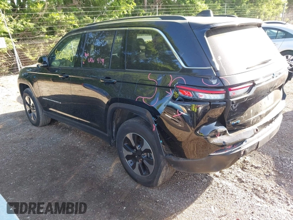 2023 Jeep Grand Cherokee with VIN 1C4RJYB68PC648859, listed as a IAAI auction lot 42267180 with 29,809 mi miles and . Bid and sale history available at DreamBid. Image 3.
