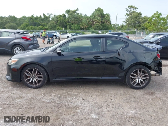 2014 Scion tC z VIN JTKJF5C76E3078256, wystawiony jako IAAI lot #42437930 z przebiegiem 239 399 mil mil oraz . Historia ofert i sprzedaży dostępna na DreamBid. Obrazek 14.