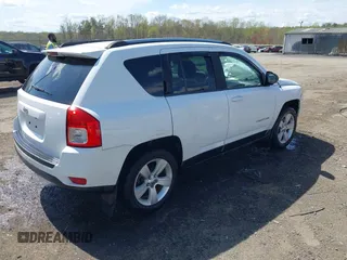 2012 Jeep Compass Sport with VIN 1C4NJDBB1CD588884, listed as a IAAI auction lot 41918765 with 199,008 mi miles. Bid and sale history available at carsss.com. Image 4.
