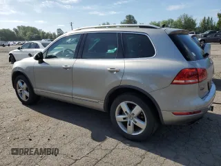 2012 Volkswagen Touareg с VIN WVGEG9BP6CD008533, выставлен на аукционе Copart как лот 60356345 с пробегом 103 270 миль миль и Чистый • Clean title. История ставок и продаж доступна на DreamBid. Изображение 2.