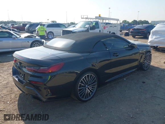 2022 BMW 8 Series with VIN WBAFY4C04NCJ78602, listed as a IAAI auction lot 42034279 with 11,757 mi miles and . Bid and sale history available at DreamBid. Image 4.