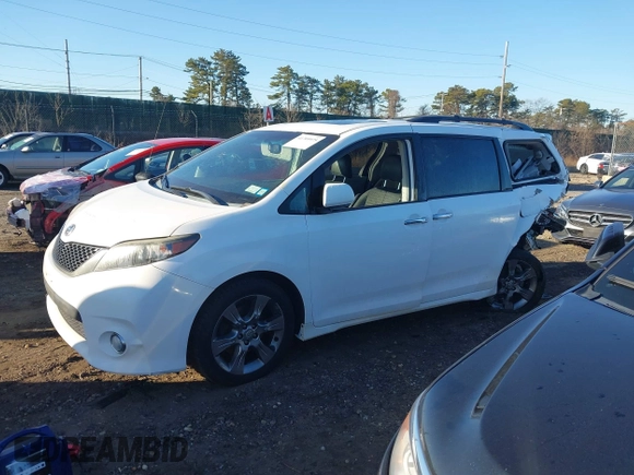 2014 Toyota Sienna SE with VIN 5TDXK3DC1ES503751, listed as a IAAI auction lot 41709975 with 229,771 mi miles and . Bid and sale history available at DreamBid. Image 14.
