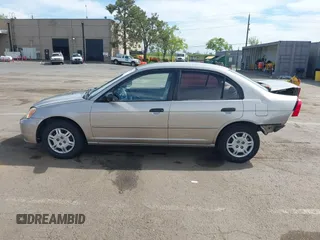 2001 Honda Civic LX with VIN 2HGES16511H554168, listed as a IAAI auction lot 42009621 with 163,801 mi miles. Bid and sale history available at carsss.com. Image 15.