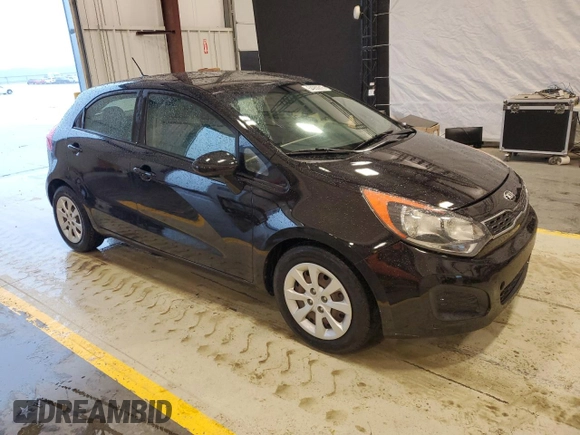 2012 Kia Rio LX with VIN KNADM5A36C6017394, listed as a Copart auction lot 54950815 with 121,300 mi miles and Clean Title. Bid and sale history available at DreamBid. Image 4.