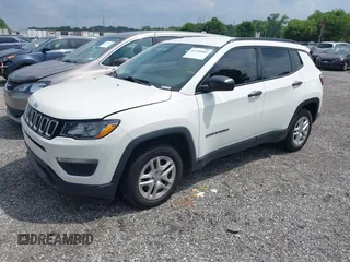 2018 Jeep Compass Sport with VIN 3C4NJCAB0JT124679, listed as a IAAI auction lot 42720262 with 119,267 mi miles and . Bid and sale history available at DreamBid. Image 19.