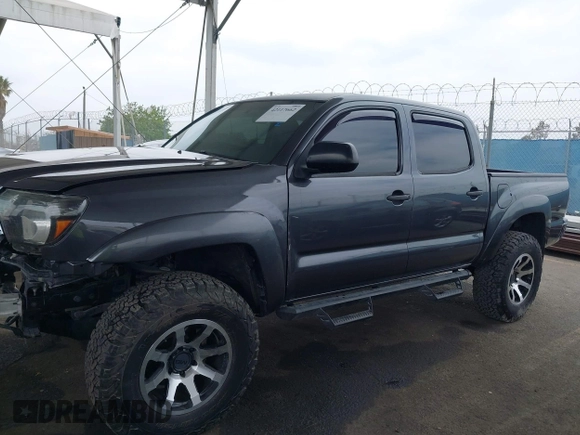 2015 Toyota Tacoma with VIN 3TMLU4EN8FM167337, listed as a IAAI auction lot 42117662 with 60,929 mi miles. Bid and sale history available at carsss.com. Image 14.