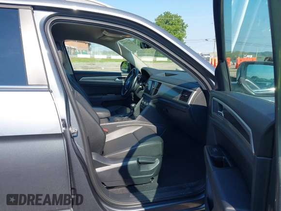 2019 Volkswagen Atlas SE with VIN 1V2WR2CA4KC620074, listed as a IAAI auction lot 42657399 with 75,306 mi miles and . Bid and sale history available at DreamBid. Image 5.