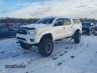 2014 Toyota Tacoma with VIN 3TMLU4EN0EM147193, listed as a IAAI auction lot 41280636 with 162,345 mi miles. Bid and sale history available at carsss.com. Image 17.