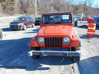 2006 Jeep Wrangler SE with VIN 1J4FA29S16P712101, listed as a IAAI auction lot 41347042 with 129,063 mi miles. Bid and sale history available at carsss.com. Image 12.