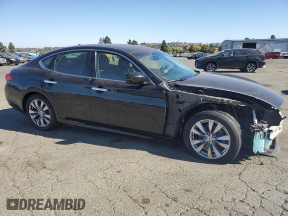 2012 Infiniti M37 with VIN JN1BY1AP5CM330588, listed as a Copart auction lot 70862854 with 112,427 mi miles and Salvage Title. Bid and sale history available at carsss.com. Image 4.