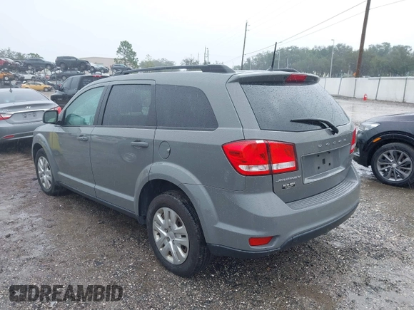 2019 Dodge Journey SE with VIN 3C4PDCBB2KT804440, listed as a IAAI auction lot 41333876 with 72,209 mi miles and . Bid and sale history available at DreamBid. Image 3.